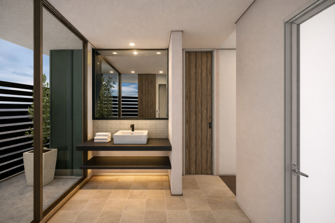 空間に合わせて仕立てた造作洗面は、素材感と照明まで計算した上質な佇まい。 朝の支度も、サウナ後のクールダウンも、気持ちを切り替える特別な時間に。